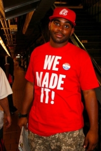 Supporter wears homemade Obama T-shirt in New York subway day after clinching nomination.